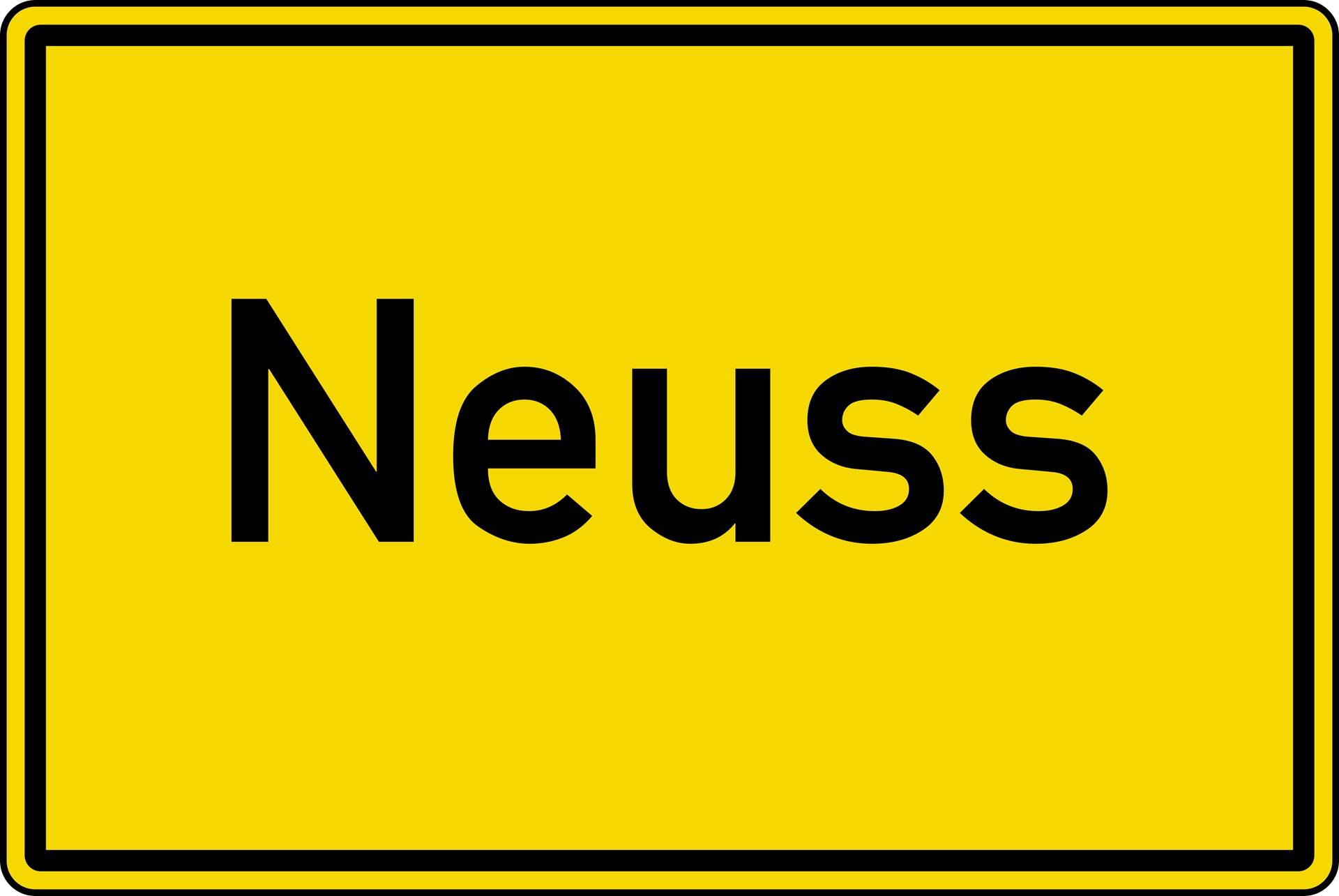 Gelbes Ortsschild der Stadt Neuss | Baufinanzierung Neuss